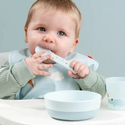 Babero con velcro Playground Blue · Done by Deer